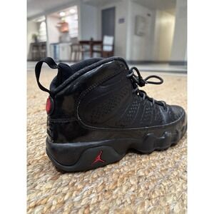 Size 6Y pre owned pair of black Air Jordan 9 Retro Bred No Box